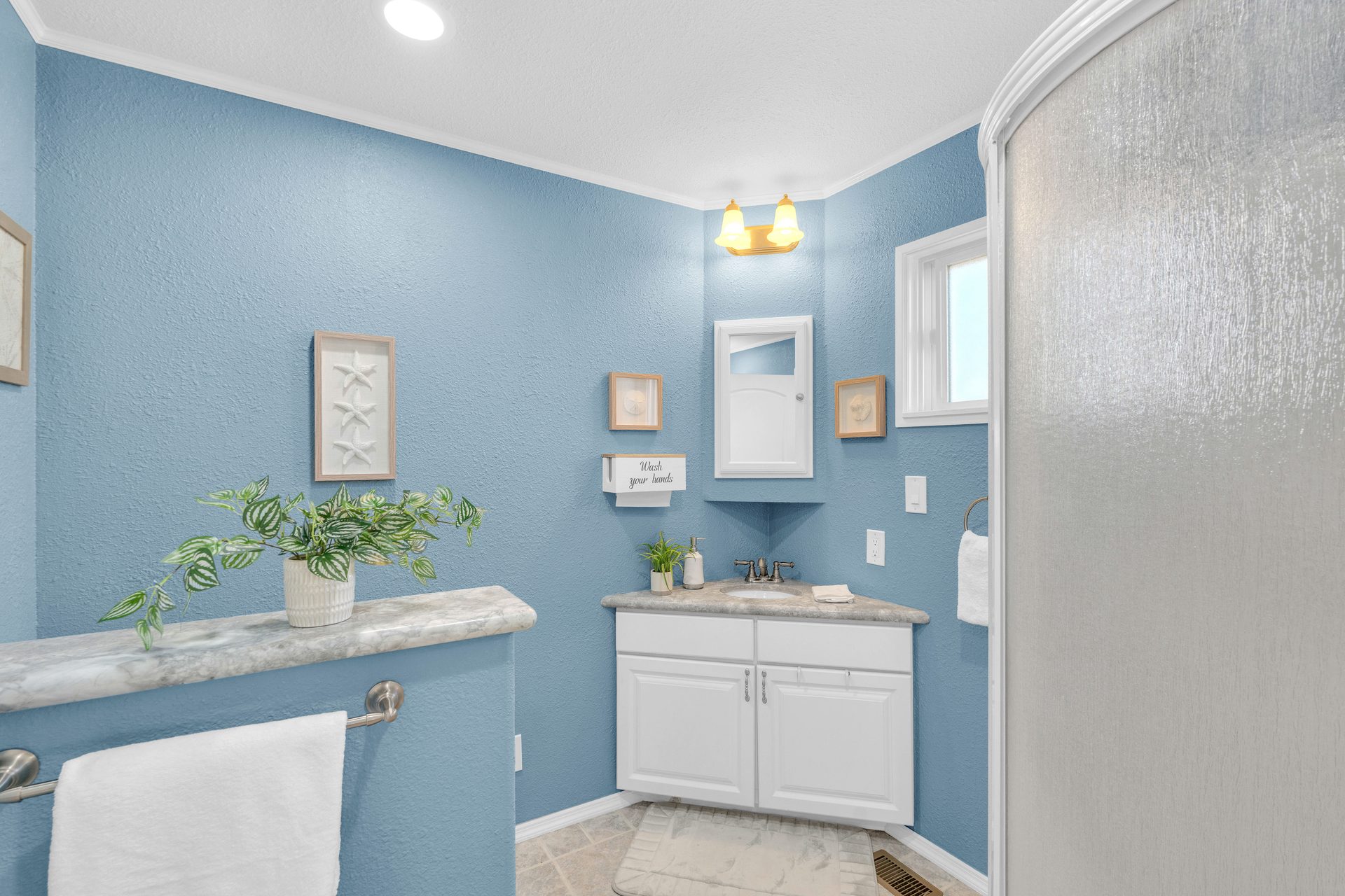 Third full bath blue accent walls