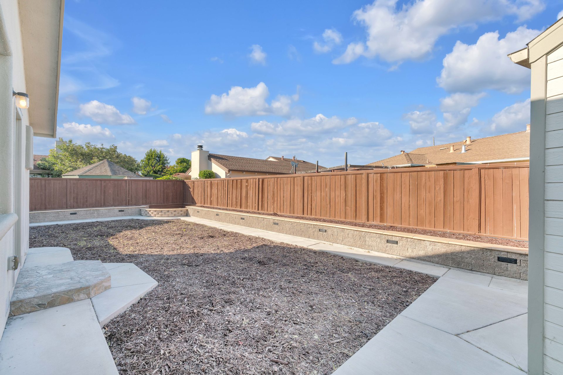 Backyard retaining walls and fencing